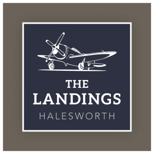Badger Building The Landings Logo